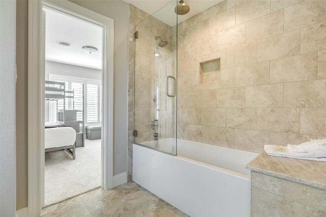 14001/14009 W Hughes Rd, Dickinson, TX 77539 - bathroom featuring ensuite bathroom and a combined bath / shower with rainfall shower