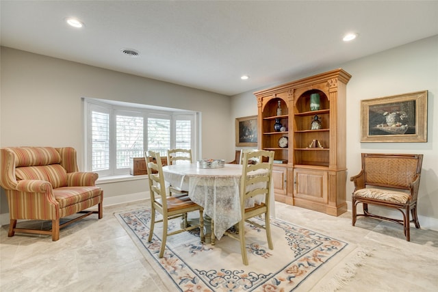 14001/14009 W Hughes Rd, Dickinson, TX 77539 - dining space featuring recessed lighting and baseboards