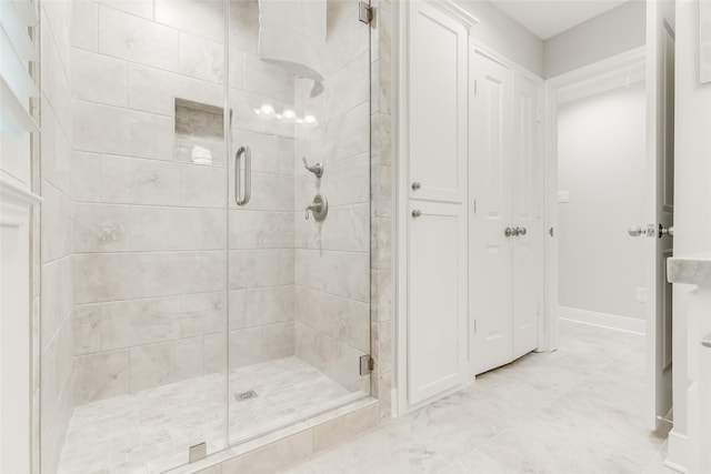 14001/14009 W Hughes Rd, Dickinson, TX 77539 - bathroom with a stall shower and baseboards