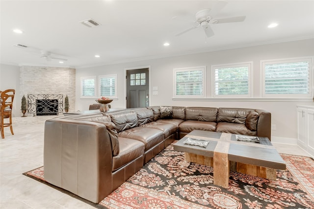 14001/14009 W Hughes Rd, Dickinson, TX 77539 - living room featuring a ceiling fan, crown molding, recessed lighting, and a fireplace