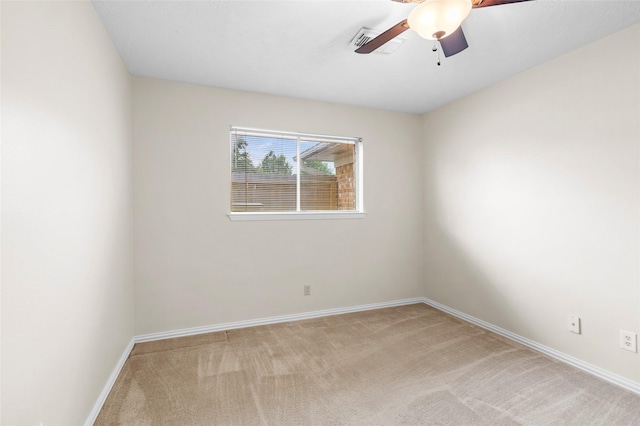 1102 Brenda Dr, Deer Park, TX 77536 - spare room with carpet floors, ceiling fan, and baseboards