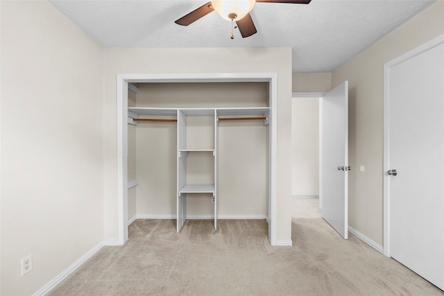 1102 Brenda Dr, Deer Park, TX 77536 - unfurnished bedroom with light colored carpet, baseboards, a closet, and ceiling fan