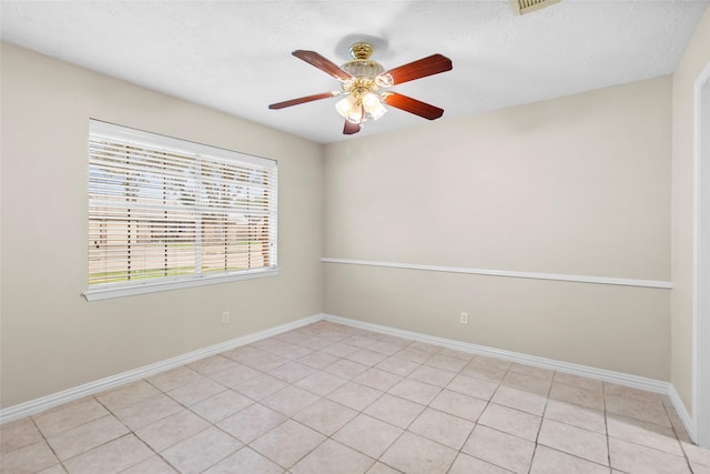 1102 Brenda Dr, Deer Park, TX 77536 - unfurnished room featuring a ceiling fan, baseboards, and light tile patterned floors