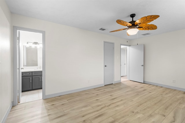 1102 Brenda Dr, Deer Park, TX 77536 - empty room with light wood-type flooring, baseboards, a ceiling fan, and a sink