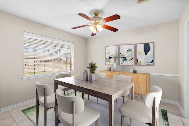 1102 Brenda Dr, Deer Park, TX 77536 - dining room with a ceiling fan, baseboards, and light tile patterned flooring