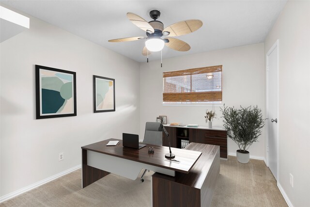 1102 Brenda Dr, Deer Park, TX 77536 - home office with light colored carpet, ceiling fan, and baseboards