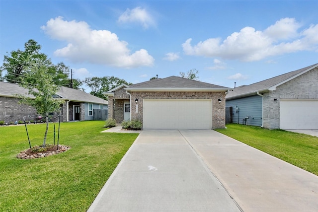 25707 Hickory Pecan Trl, Tomball, TX 77375 - single story home with brick siding, a front yard, and an attached garage