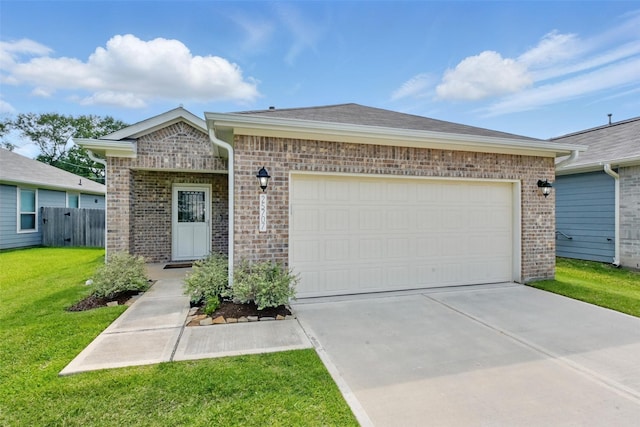 25707 Hickory Pecan Trl, Tomball, TX 77375 - ranch-style home with brick siding, concrete driveway, and a garage