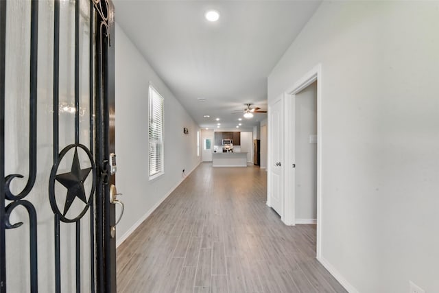 25707 Hickory Pecan Trl, Tomball, TX 77375 - entryway with wood finished floors, baseboards, ceiling fan, and recessed lighting