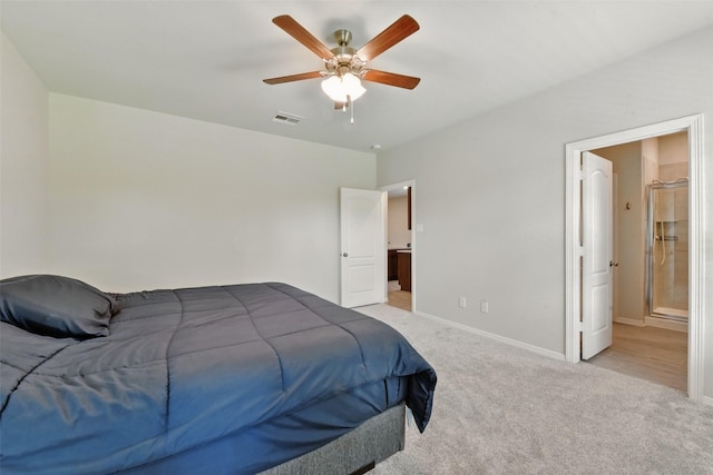 25707 Hickory Pecan Trl, Tomball, TX 77375 - bedroom featuring light carpet, baseboards, ceiling fan, and ensuite bathroom