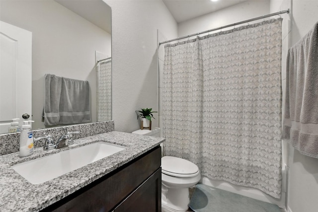 25707 Hickory Pecan Trl, Tomball, TX 77375 - bathroom featuring toilet, vanity, and shower / tub combo