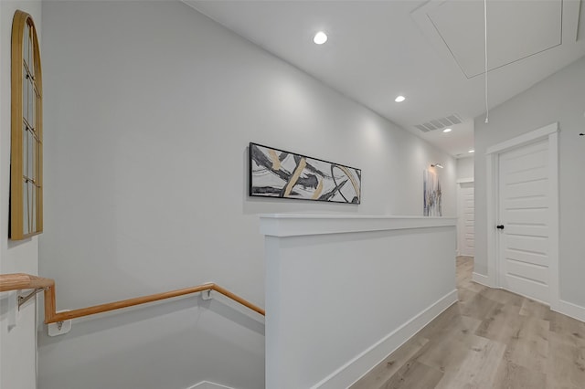 2105 Sam Wilson St Unit C, Houston, TX 77020 - hallway featuring attic access, light wood-style flooring, recessed lighting, and baseboards