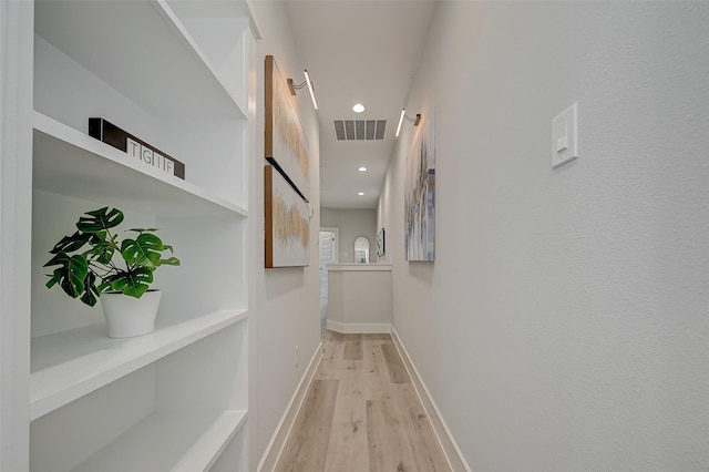 2105 Sam Wilson St Unit C, Houston, TX 77020 - corridor with wood finished floors, recessed lighting, and baseboards