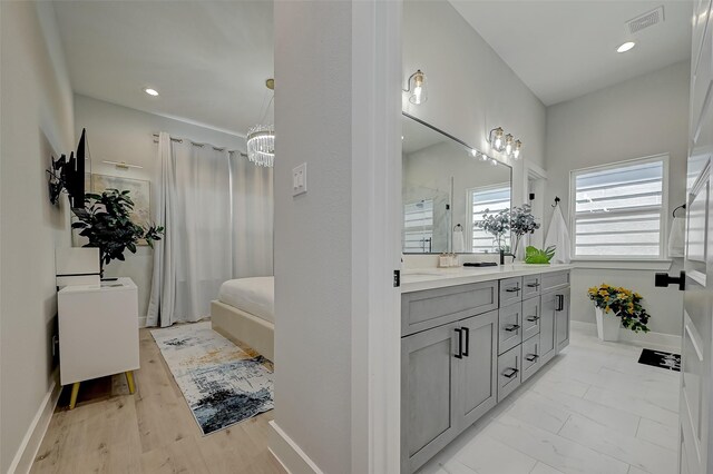 2105 Sam Wilson St Unit C, Houston, TX 77020 - bathroom featuring vanity, a shower with curtain, a bathtub, a chandelier, and recessed lighting
