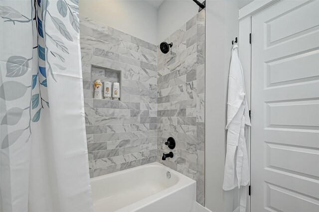 2105 Sam Wilson St Unit C, Houston, TX 77020 - bathroom featuring shower / bath combo with shower curtain