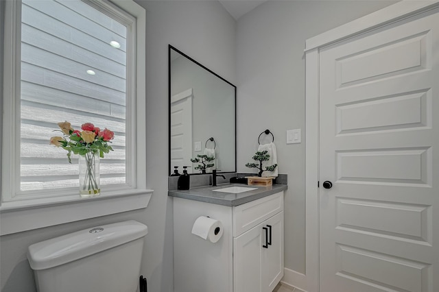 2105 Sam Wilson St Unit C, Houston, TX 77020 - half bathroom with toilet, vanity, and baseboards