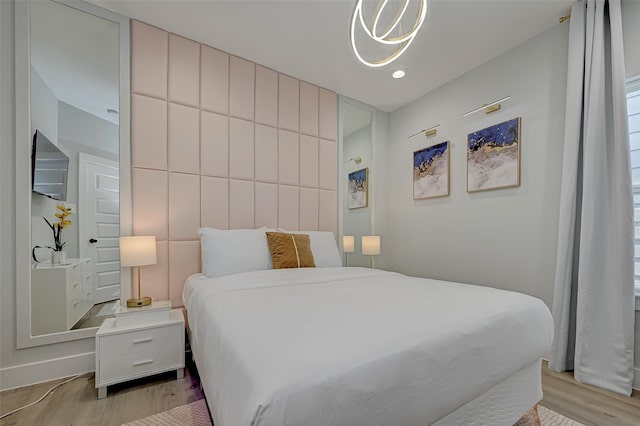 2105 Sam Wilson St Unit C, Houston, TX 77020 - bedroom featuring light wood-style floors and recessed lighting