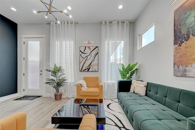 2105 Sam Wilson St Unit C, Houston, TX 77020 - living room with wood finished floors, a chandelier, and recessed lighting
