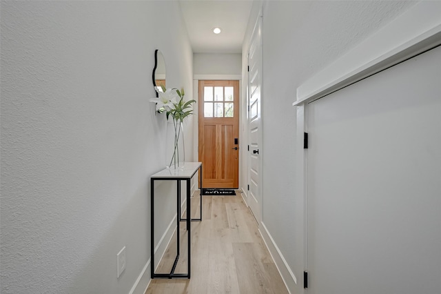 2105 Sam Wilson St Unit C, Houston, TX 77020 - entryway featuring light wood-style floors, baseboards, and recessed lighting