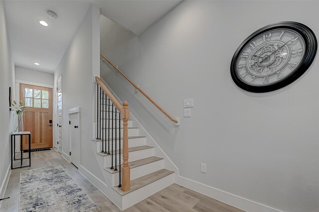 2105 Sam Wilson St Unit C, Houston, TX 77020 - stairway featuring wood finished floors, baseboards, and recessed lighting