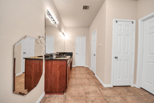 14311 Lakepointe Bend Ln, Cypress, TX 77429 - bathroom featuring vanity, tile patterned flooring, and baseboards