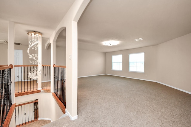 14311 Lakepointe Bend Ln, Cypress, TX 77429 - spare room with carpet flooring, baseboards, and arched walkways