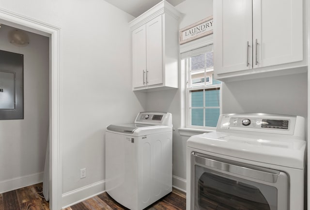 22516 Bay Point Dr, Galveston, TX 77554 - laundry room featuring separate washer and dryer, cabinet space, electric panel, dark wood-type flooring, and baseboards