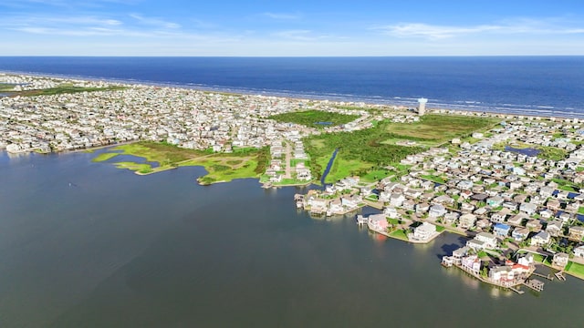 22516 Bay Point Dr, Galveston, TX 77554 - aerial overview of property's location featuring a large body of water and nearby suburban area
