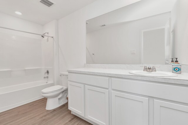 18110 Mendocino Ridge Ln, Hockley, TX 77447 - bathroom with toilet, vanity, bathing tub / shower combination, and wood finished floors