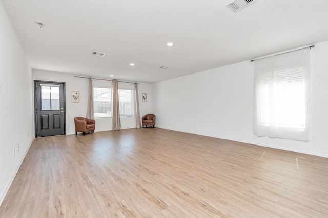 18110 Mendocino Ridge Ln, Hockley, TX 77447 - spare room with light wood-style floors, recessed lighting, and a pendent fire sprinkler