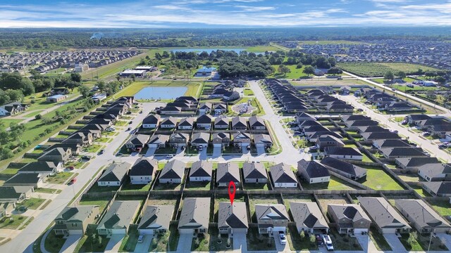 18110 Mendocino Ridge Ln, Hockley, TX 77447 - aerial overview of property's location with nearby suburban area and a nearby body of water