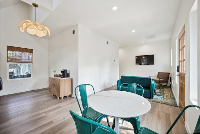 5004 Park Dr, Houston, TX 77023 - dining room with light wood-style floors and recessed lighting