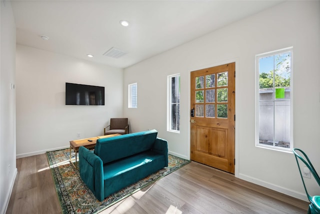 5004 Park Dr, Houston, TX 77023 - entrance foyer with healthy amount of natural light, wood finished floors, and recessed lighting