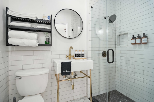 5004 Park Dr, Houston, TX 77023 - bathroom with a shower stall and tile walls