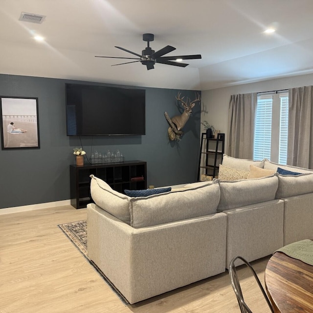 29919 Gallatin River Ln, Katy, TX 77494 - living room with ceiling fan, wood finished floors, and baseboards