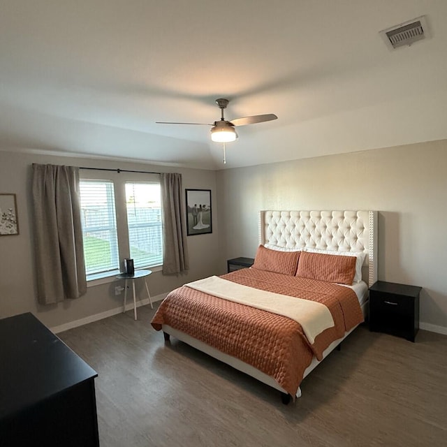 29919 Gallatin River Ln, Katy, TX 77494 - bedroom with wood finished floors, baseboards, and ceiling fan