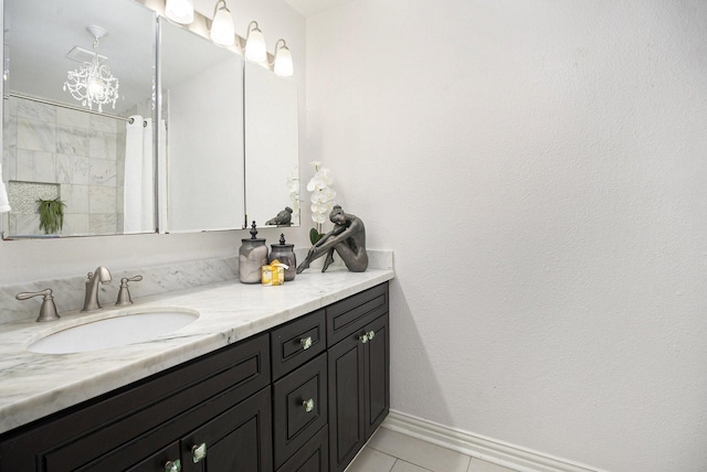 5927 Maco St, Galveston, TX 77551 - bathroom with vanity, tile patterned floors, a shower with curtain, and baseboards
