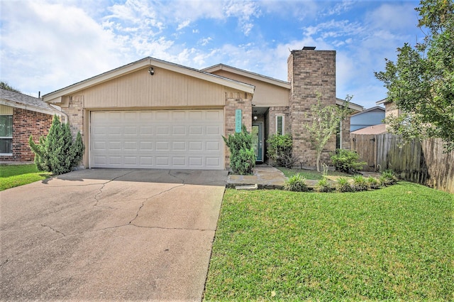 5927 Maco St, Galveston, TX 77551 - view of front of property featuring concrete driveway, brick siding, an attached garage, and a chimney