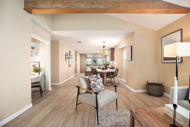 5927 Maco St, Galveston, TX 77551 - living room featuring light wood-style floors and baseboards