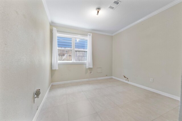 5330 Pine Cliff Dr, Houston, TX 77084 - unfurnished room featuring ornamental molding, light tile patterned flooring, and baseboards