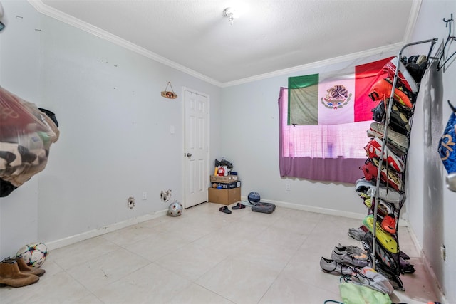 5330 Pine Cliff Dr, Houston, TX 77084 - unfurnished bedroom with crown molding, baseboards, and tile patterned floors
