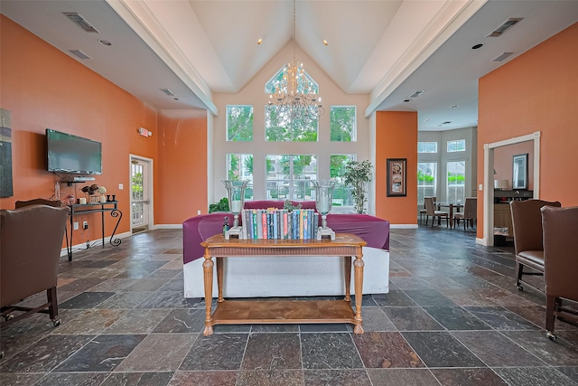 1330 Old Spanish Trl Unit 8306, Houston, TX 77054 - living area with stone tile floors, high vaulted ceiling, baseboards, and a chandelier