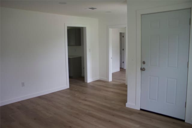 3922 Alsace St, Houston, TX 77021 - empty room with wood finished floors and baseboards