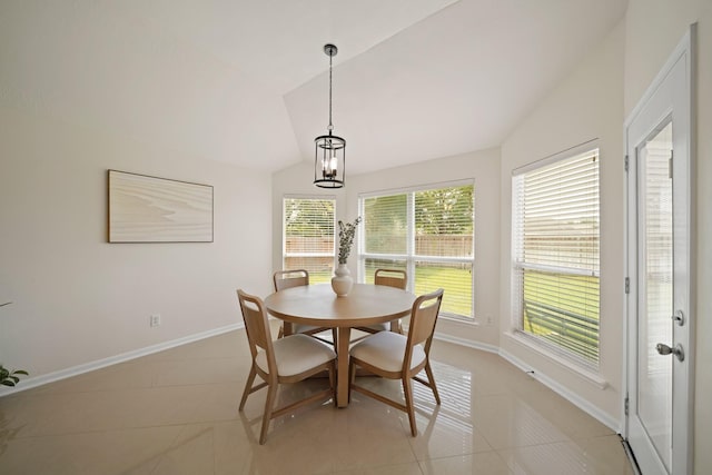 20719 Kerby Pl, Cypress, TX 77433 - dining area featuring light tile patterned flooring, lofted ceiling, baseboards, and a chandelier