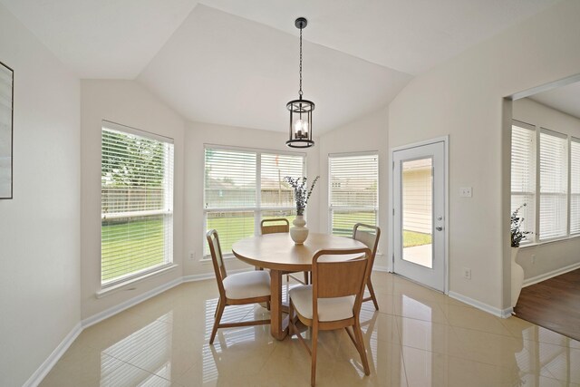 20719 Kerby Pl, Cypress, TX 77433 - dining room featuring lofted ceiling, baseboards, and light tile patterned floors