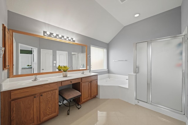 20719 Kerby Pl, Cypress, TX 77433 - bathroom with a stall shower, lofted ceiling, a bath, double vanity, and tile patterned flooring