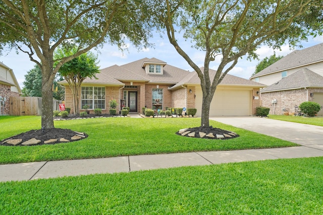 20719 Kerby Pl, Cypress, TX 77433 - view of front of home with an attached garage, brick siding, driveway, and roof with shingles