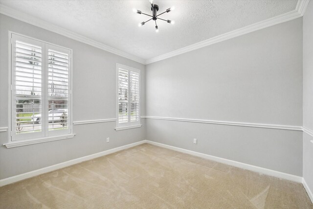 13819 Marbledale Ct, Houston, TX 77059 - spare room featuring a textured ceiling, a chandelier, carpet, baseboards, and crown molding