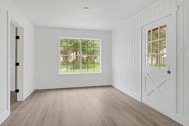 124 Rolling Wood Dr, Baytown, TX 77520 - empty room featuring wood finished floors and baseboards