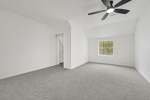 124 Rolling Wood Dr, Baytown, TX 77520 - additional living space with vaulted ceiling, carpet flooring, a ceiling fan, and baseboards